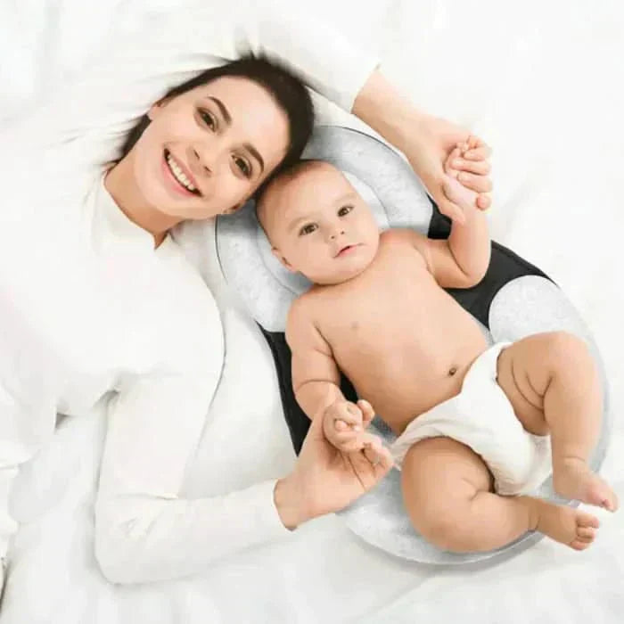 Cuscino ergonomico per neonati NurtureNest per un sonno sicuro | Temsk
